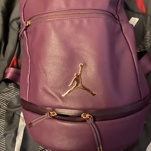 Black and Gold Jordan backpack